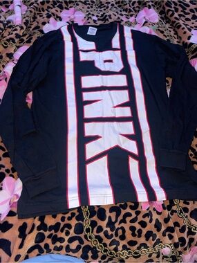 PINK vs white, red and black long sleeve in size medium